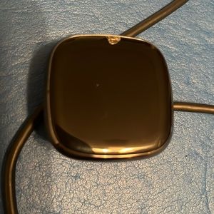 Fitbit Sense. Comes with charging cord.